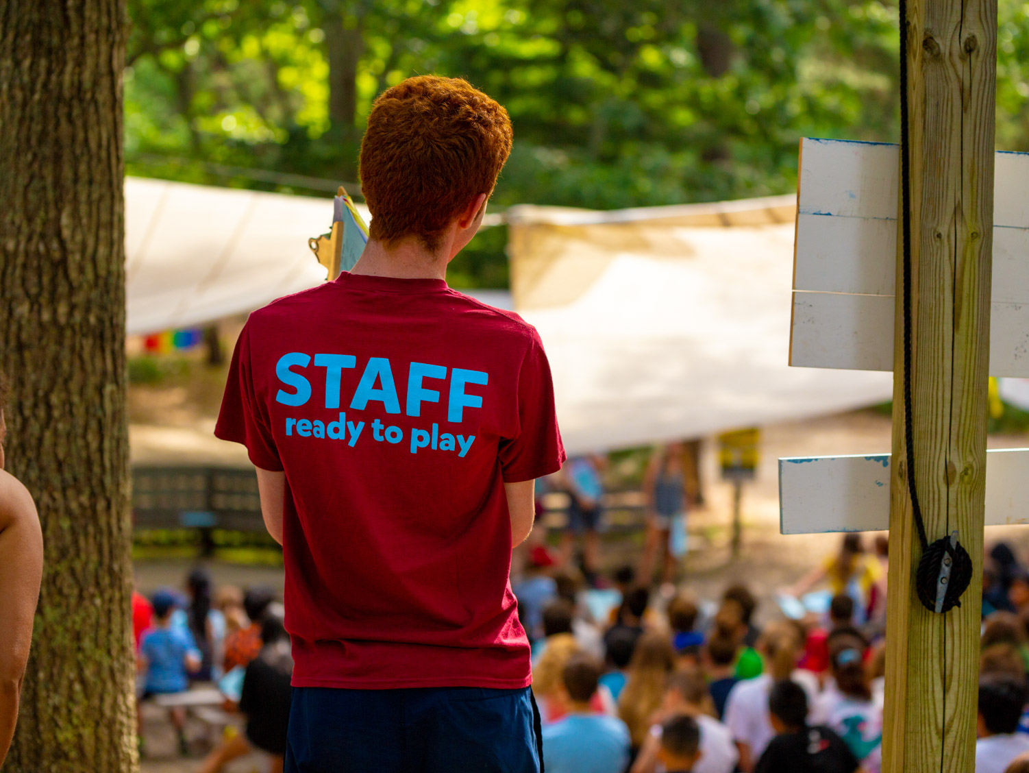 Staff member wearing a Staff shirt