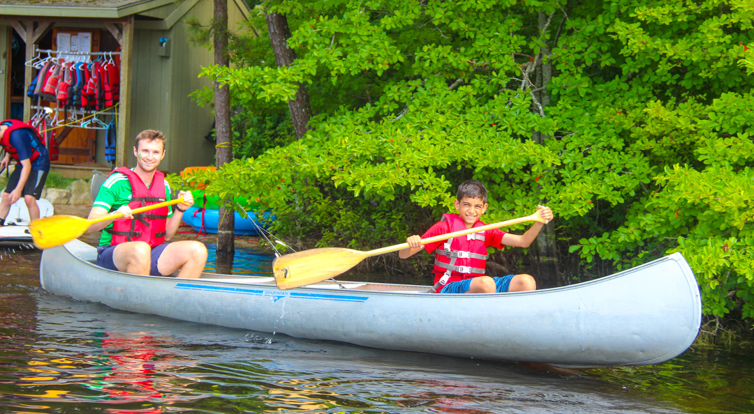 Two boys canoeing