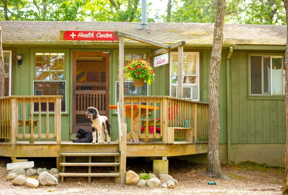 Heath Center with dogs outside on the porch