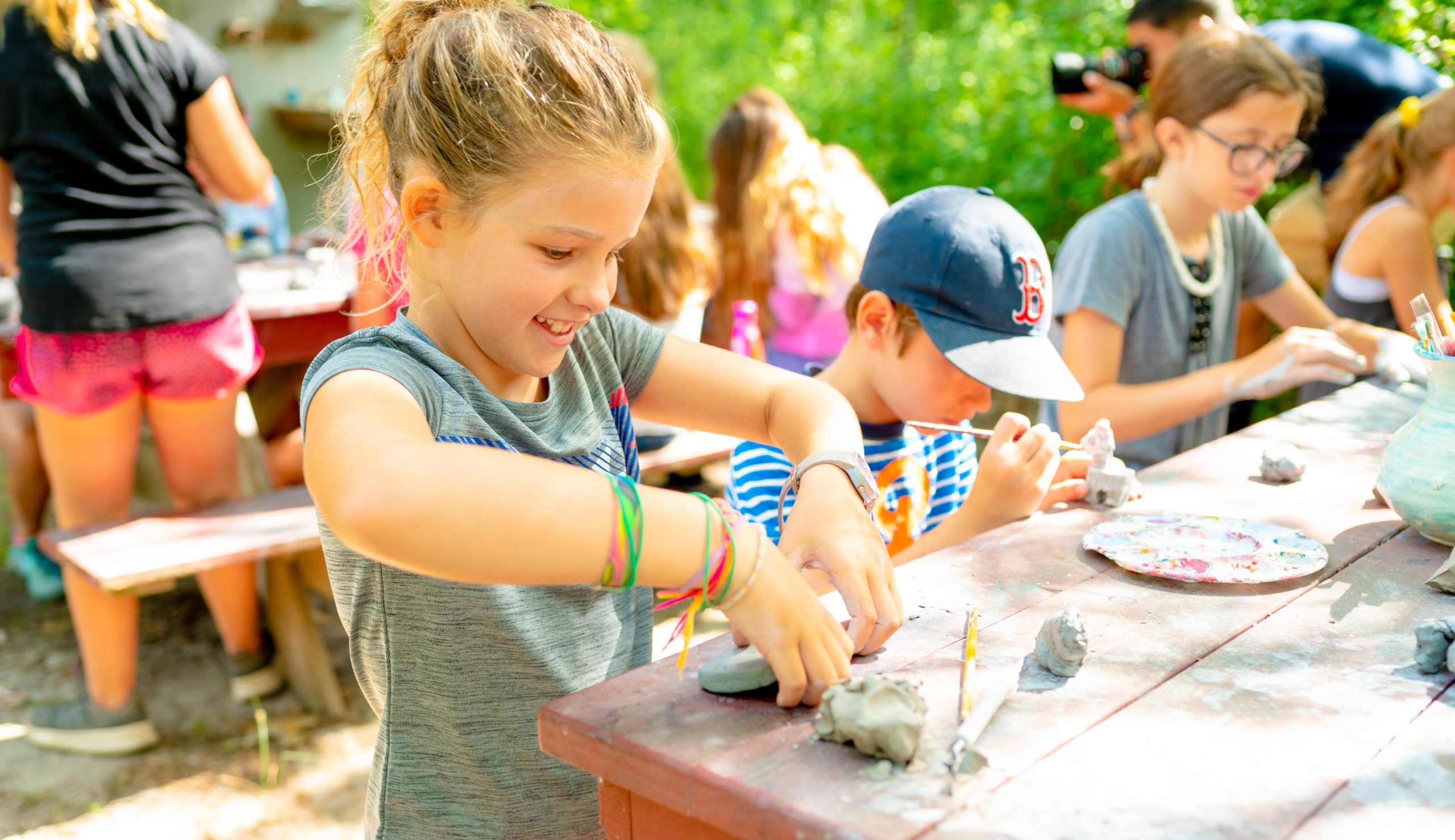 Camper playing with clay