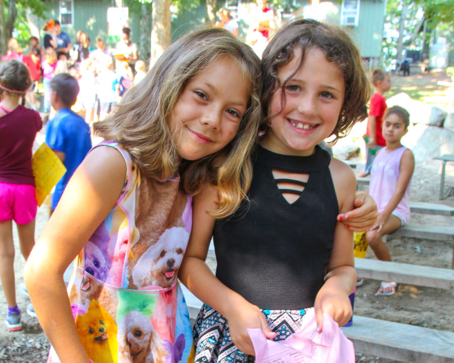 Two girls smiling