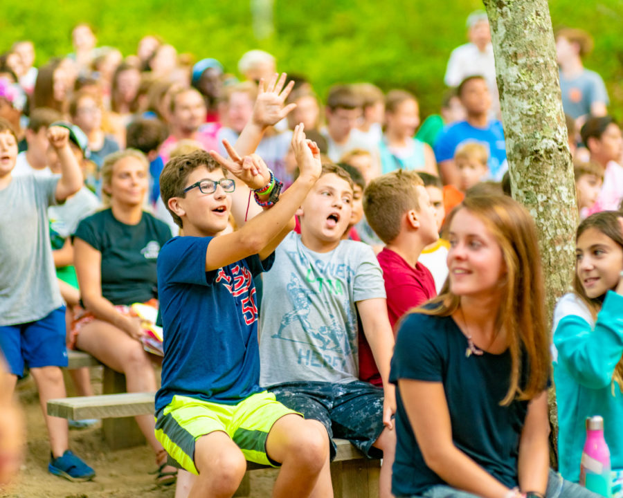 Campers having fun at morning meeting